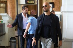 Bucharest, Romania. 30th May, 2024: Andrew Tate (R) and his brother Tristan Tate (L) arrive at the Bucharest Court of Appeal. Credit: Lucian Alecu/Alamy Live News